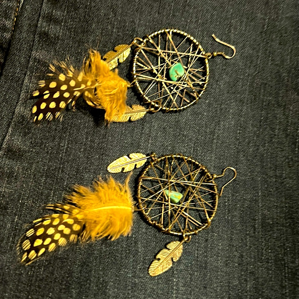Outrageous 70s style boho type earrings not sure on metal but made well